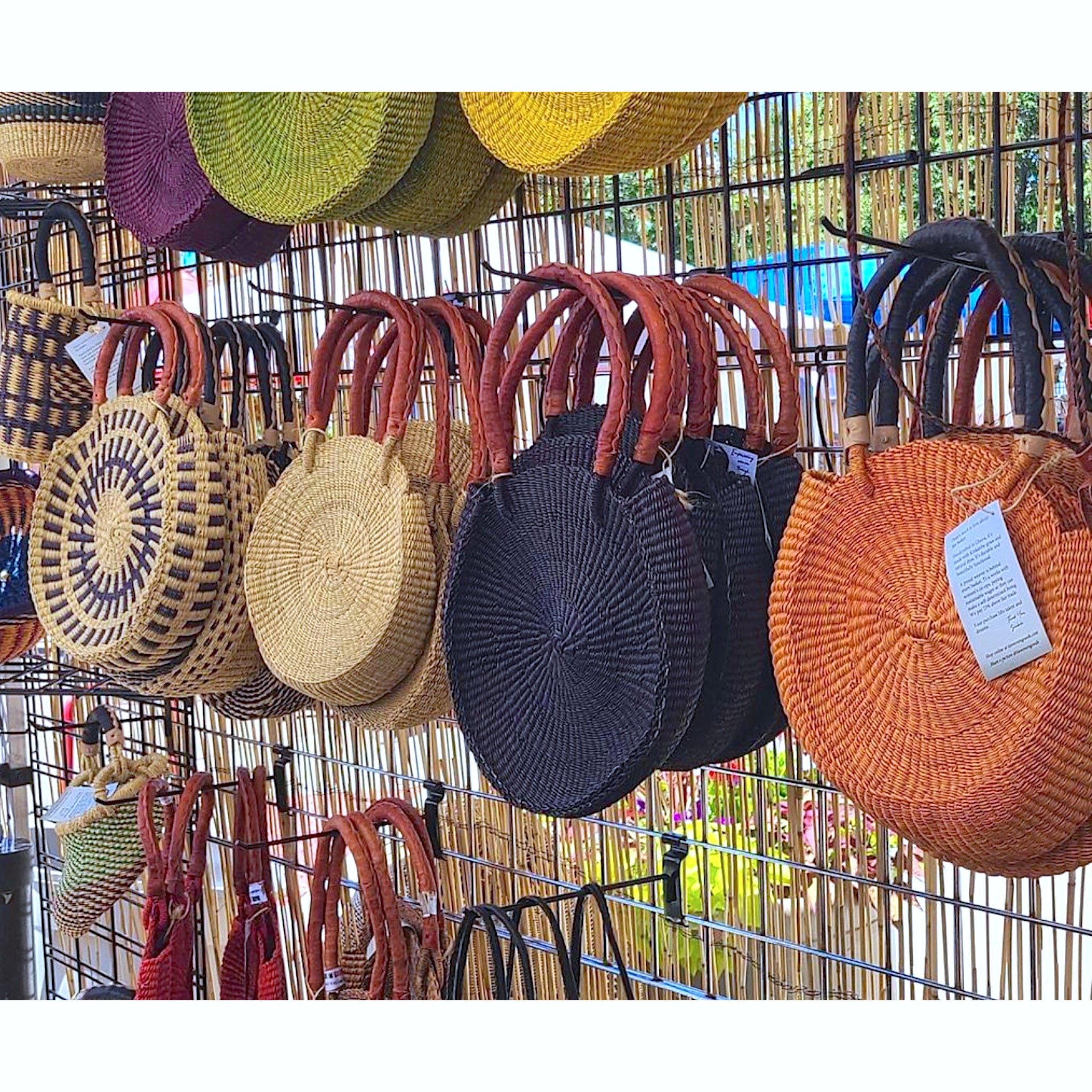 Woman in Bomber Jacket Wearing a Round Rattan Purse · Free Stock Photo